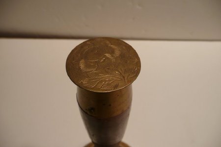 decorated cap on handle